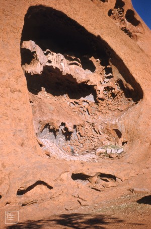 Me (blue and grey) in huge cave, Ayers Rock 1958. Mary Gillham