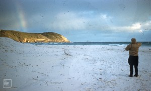 Organic detritus in eroding sand. Dune gap and rainbow. Hope [MacPherson] at Squeaky Bay. Wilsons Promontory