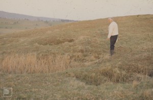 Jack Evans by swallow hole (rushes) in limestone of upper Glais above Cefn Coed. 1971