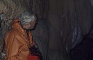 Jack Evans studies calcite curtains in Ogof Rhyd Sych, Glais Reservoir, 1975
